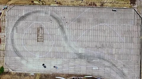 The car does drift on asphalt and burning tires Stock Footage 65180381