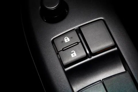 Car door lock button switch. Stock Photos