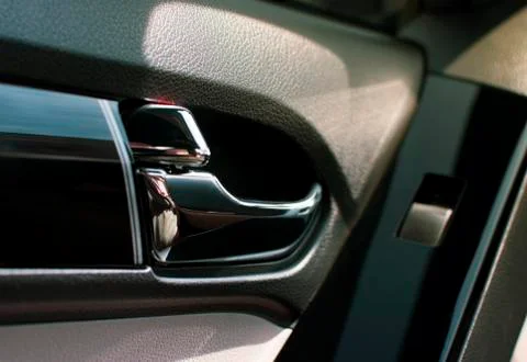 Car door lock / unlock button and chrome handle. 스톡 사진