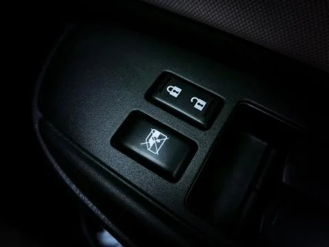 Car door panel control switch. Foto stock