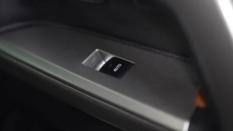 Car door panel switch button for automatic power window control. Stock Footage 344596236
