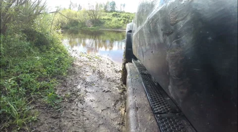 The car down the road to the river and moved deep river. Stock Footage 68041116