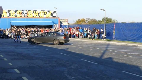 Car Drift Between People Stock Footage 81630014