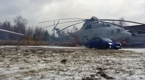 Car a drift on a sleet against the background of the helicopter slow motion Stock Footage 67229959