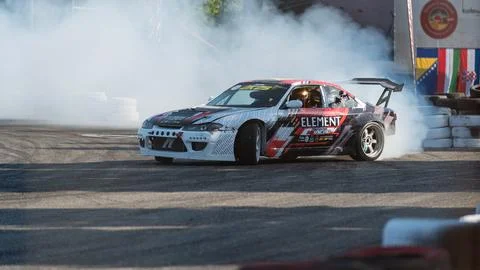 Car drifting on track Stock Photos