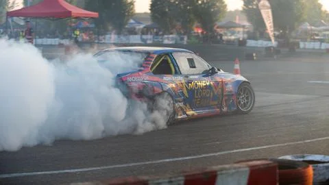 Car drifting on track Stock Photos