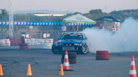 Car drifting on track Stock Photos