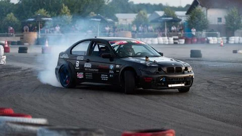 Car drifting on track Stock Photos