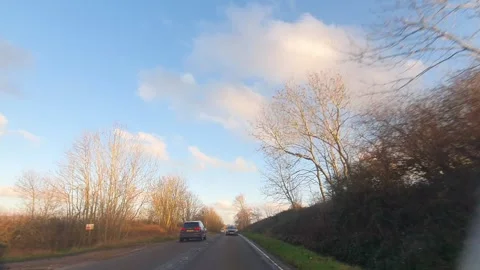 Car Drive Through British Rural Countryside Farms and Landscape Stock Footage 324786659