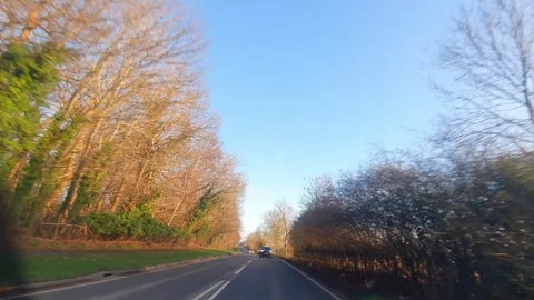 Car Drive Through British Rural Countryside Farms and Landscape Stock Footage 324786872