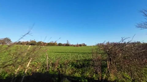 Car Drive Through British Rural Countryside Farms and Landscape Stock Footage 324820280