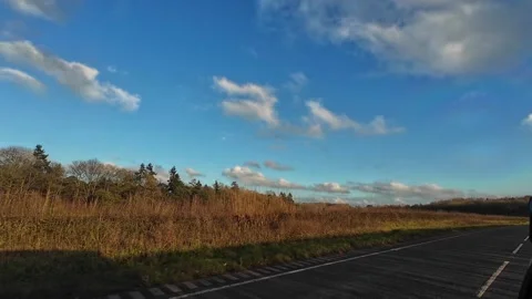 Car Drive Through British Rural Countryside Farms and Landscape Stock Footage 324827283