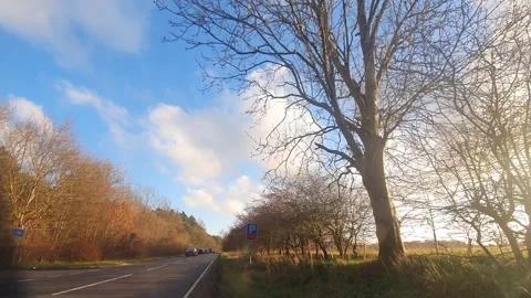 Car Drive Through British Rural Countryside Farms and Landscape Stock Footage 324828994