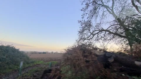 Car Drive Through British Rural Countryside Farms and Landscape Stock Footage 324829076