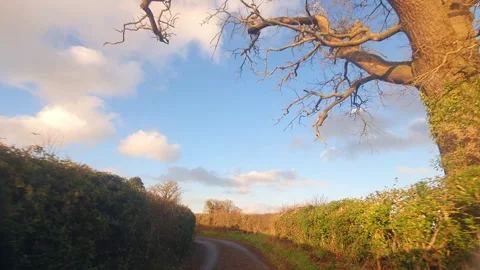 Car Drive Through British Rural Countryside Farms and Landscape Stock Footage 324829083