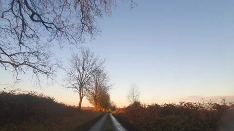Car Drive Through British Rural Countryside Farms and Landscape Stock Footage 324830245