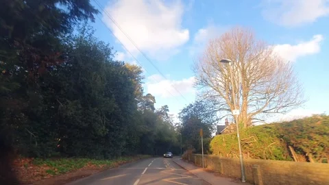 Car Drive Through British Rural Countryside Farms and Landscape Stock Footage 324831653