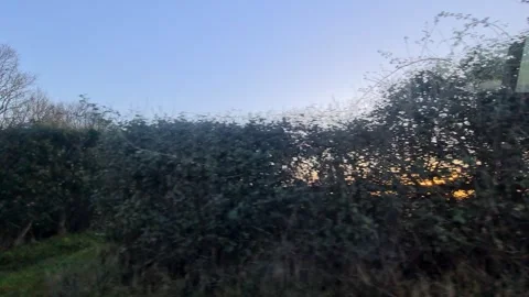 Car Drive Through British Rural Countryside Farms and Landscape Stock Footage 324831660