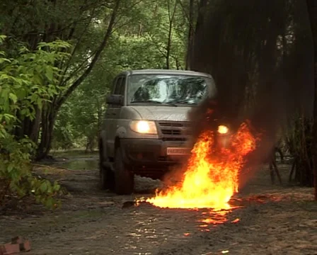 Car drive through fire Vídeo Stock 6504416