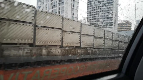 CAR drive through on heavy rain road, Hand held camera. Stock Footage 117096086
