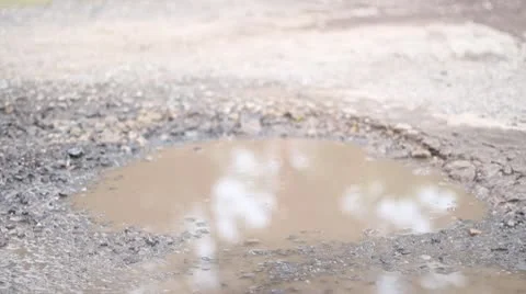 Car drive through puddle 2nd angle 스톡 동영상 10586224