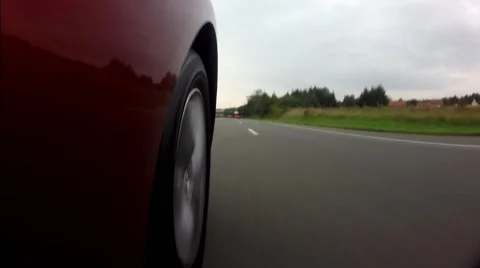 Car Drive from wheel perspective 스톡 동영상 47103275