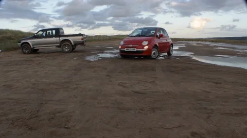 Car Driven On Beach Stock-Footage 101683636