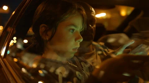 The car is driven with passengers in the back seat. Stock Footage 54995638