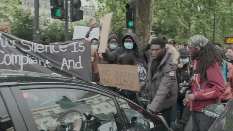 Car driven at Protesters Blocking road at Black Lives Matter Protest London Stock Footage 132108019