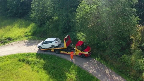 Car driven off the road is loaded on a tow truck Stock Footage 161109922