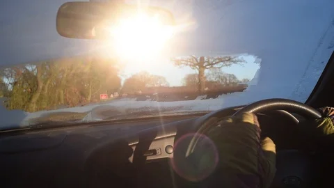 Car driver driving with frozen windscreen york yorkshire united kingdom Stock Footage 102941329