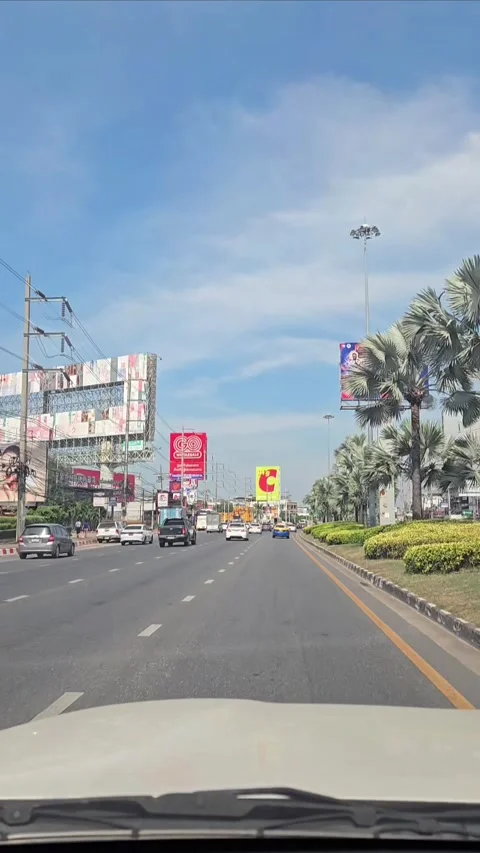 Car driver point of view, city of Pattaya street. Sukhumvit road. Driving plate. Stock Footage 296261634