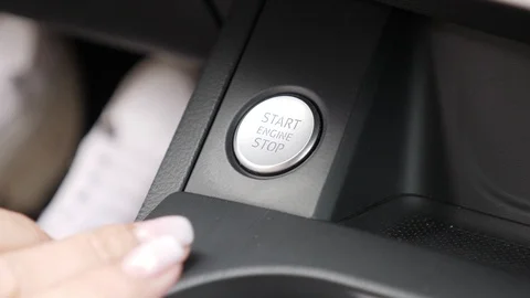 Car driver starting the engine Stock Footage 127756344