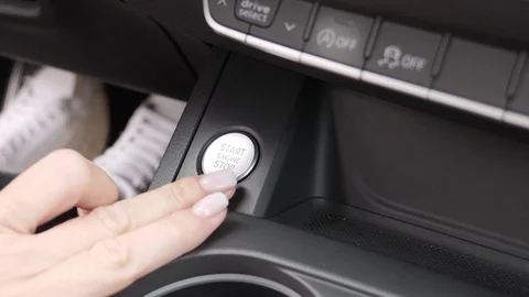 Car driver starting the engine Stock Footage 127756653