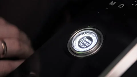 Car driver starting the engine. Stock Footage 193996935