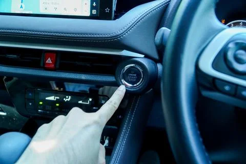 Car driver starting the engine start, stop engine button.Concept of transpo.. Stock Photos