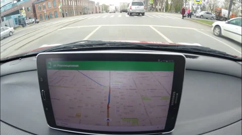 A car driver using a Google Navigator application on Android device Samsung Stock Footage 55806929