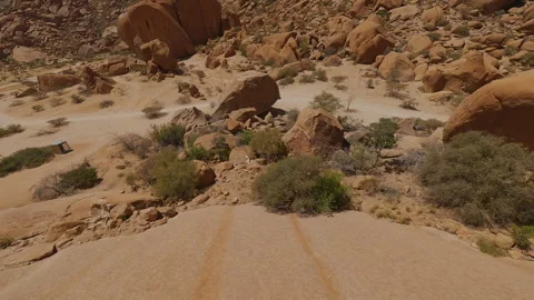 A Car Drives Between Large Stones Stock Footage 297254873