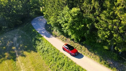 Car Drives drives through nature Stock Footage