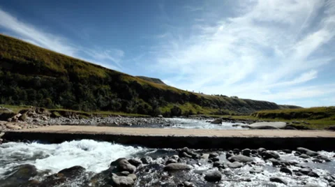 Car drives over bridge Stock Footage 27363804