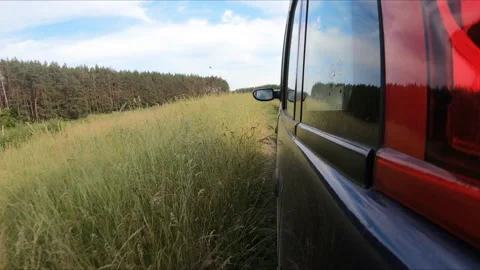 The car drives through the countryside. Stock Footage 157579699