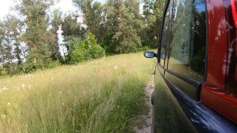 The car drives through the countryside. Stock Footage 157580114
