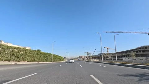 Car Driving Across Scenic City District Streets New Cairo Showing Buildings Stock Footage 329674853