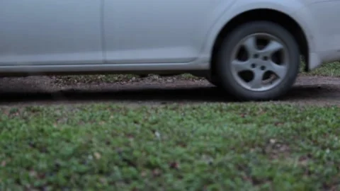Car driving along an empty forest road Stock Footage 155371242