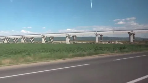 The car is driving along a highway 库存影片 335705618