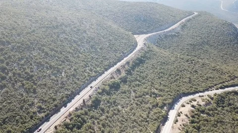 Car Driving Along Mountain Stock Footage 88673440