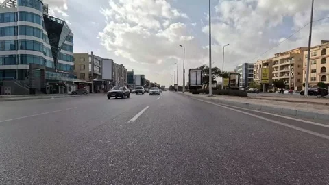 Car Driving Along Smooth Roads New Cairo Showing Buildings Traffic And City Stock Footage 329659765