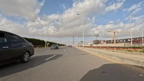 Car Driving Along Smooth Roads New Cairo Showing Buildings Traffic And City Stock Footage 329660376