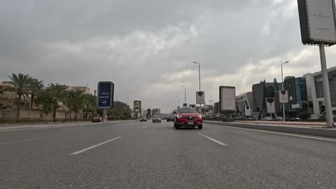 Car Driving Along Smooth Roads New Cairo Showing Buildings Traffic And City Stock Footage 330112513