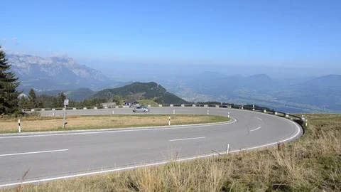 Car driving up Alpine Road Stock Footage 111292426